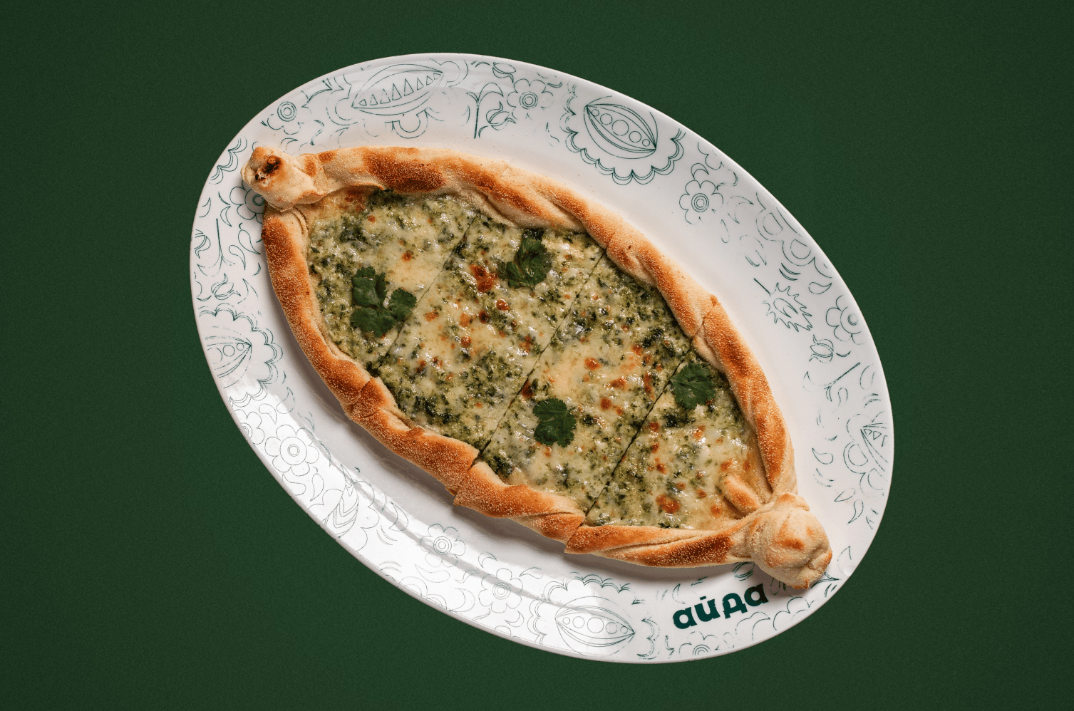 Pide with cheese and spinach